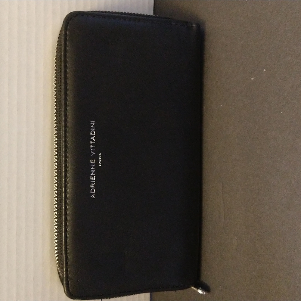 GUC. Adrienne Vittadini black wallet.